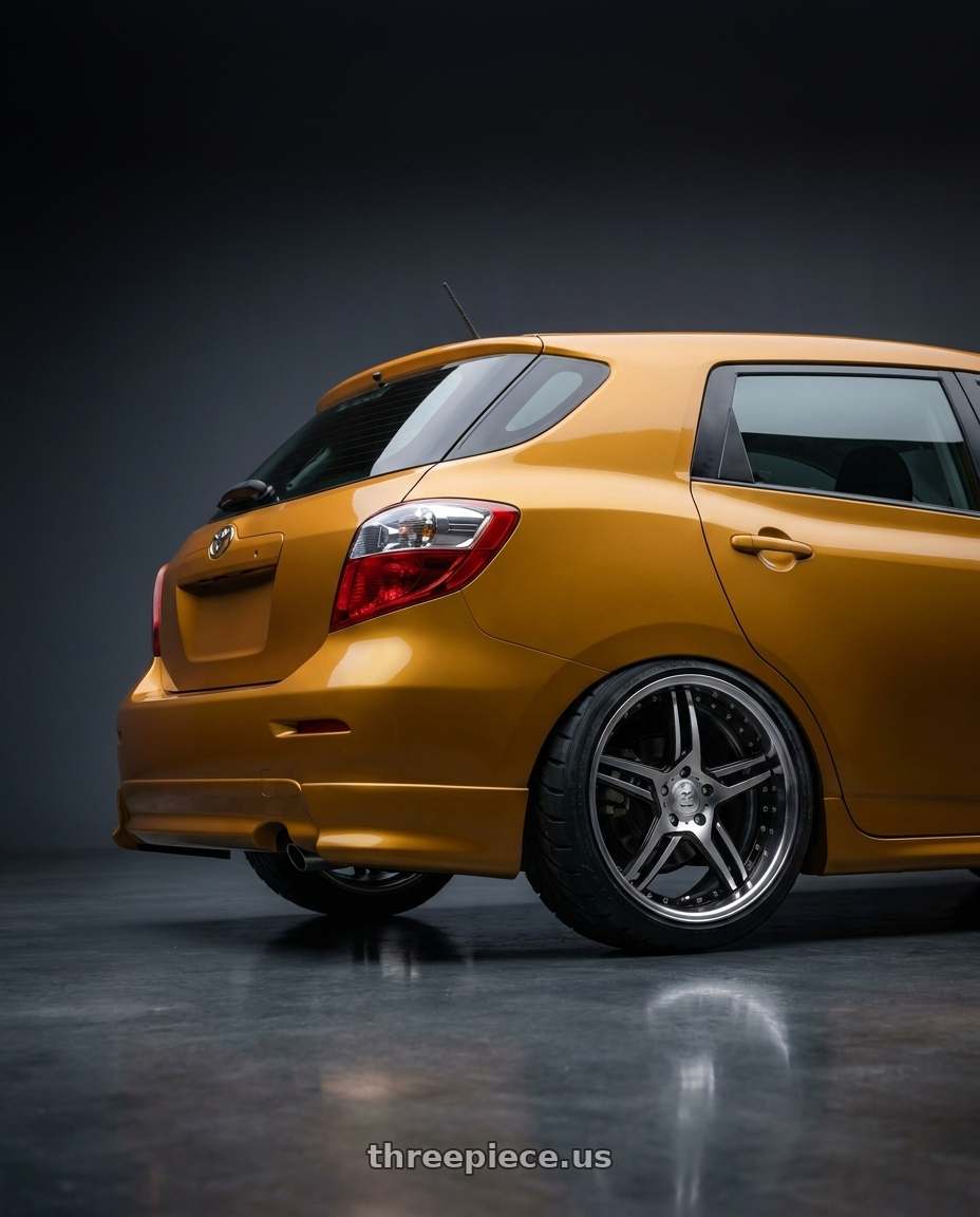 2009 toyota matrix with Enkei EKM3 5x100 18x7.5+45 Hyper Silver wheels rear three quarter view meaty tires