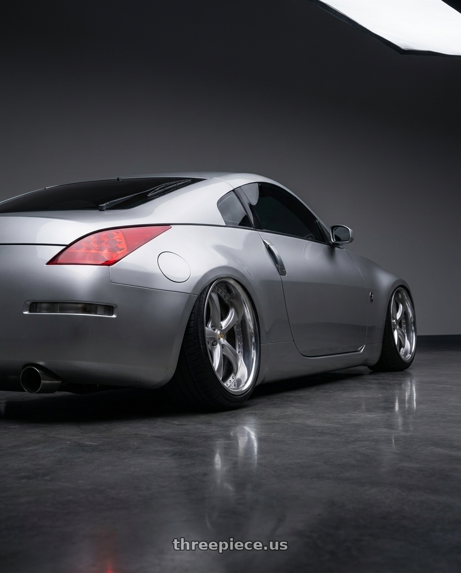2005 Nissan 350z with Work Wheels VS-KF 5x98 19x10-48 Light Grey Silver L Disk FULL REVERSE wheels rear three quarter view square tires