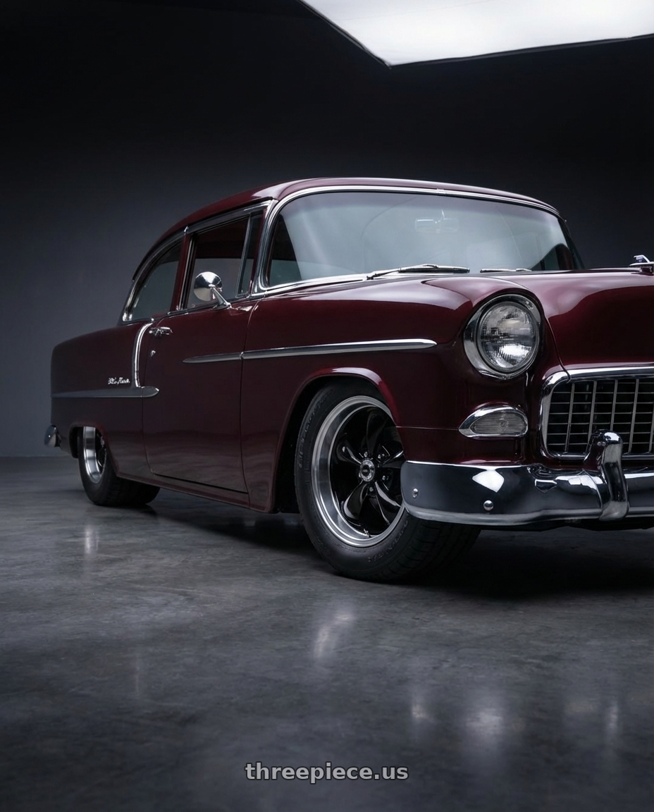 1955 chevrolet  belair with American Racing AR105 TORQ THRUST M 5X114.3 17X9 +24 GLOSS BLACK W/ MACHINED LIP wheels front three quarter view slammed stance