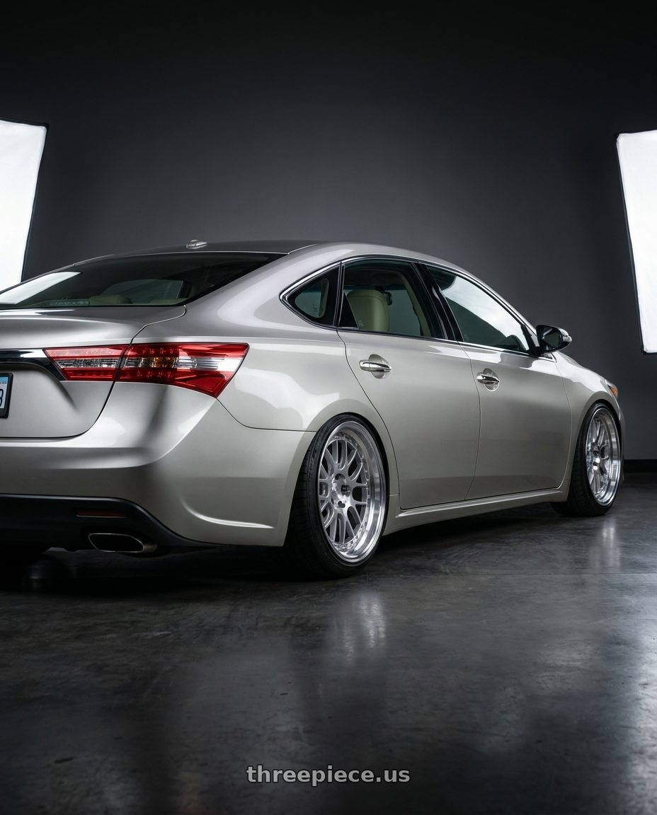 2013 toyota avalon with Aodhan DS06 5x114.3 19x9.5+22 Silver w/Machined Face wheels rear three quarter view extreme stretch tires