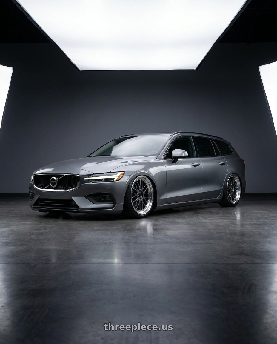 2018 Volvo V60 with Vors VR8 5x108 20x9.5  +35 Hyper Black Machine Lip Chrome Rivet wheels front three quarter view stanced stance