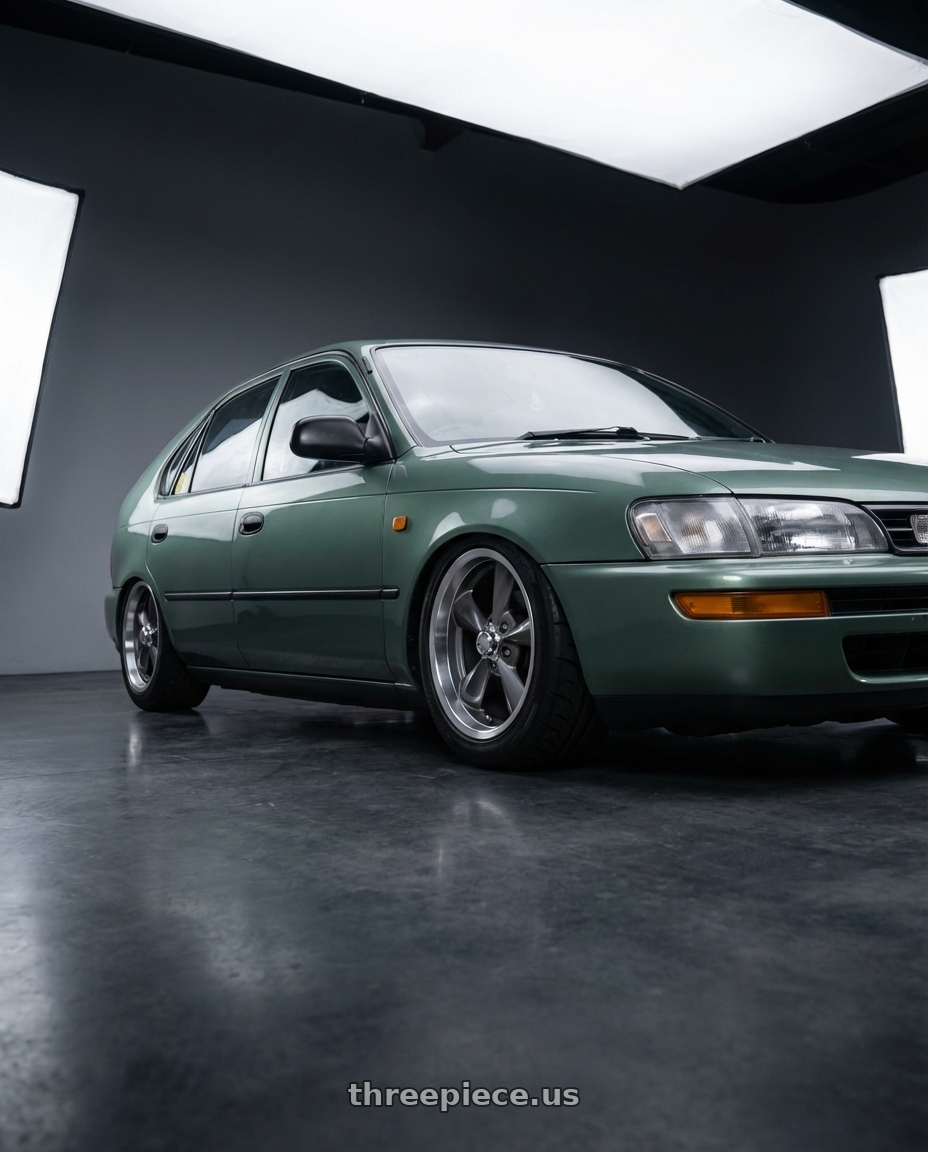 1998 Toyota corolla   with BG Rod Works Old School 5x114.3 15x8+0 Gun Metal Machined Lip wheels