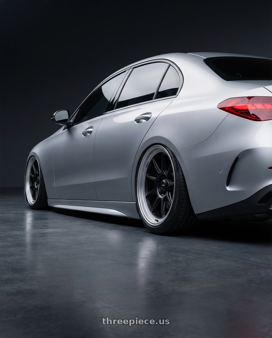 2022 Mercedes-Benz C-Class W206 with Konig Countergram 5x112 19x9.5+30 Matte Black / Matte Machined Lip wheels rear three quarter view slight stretch tires