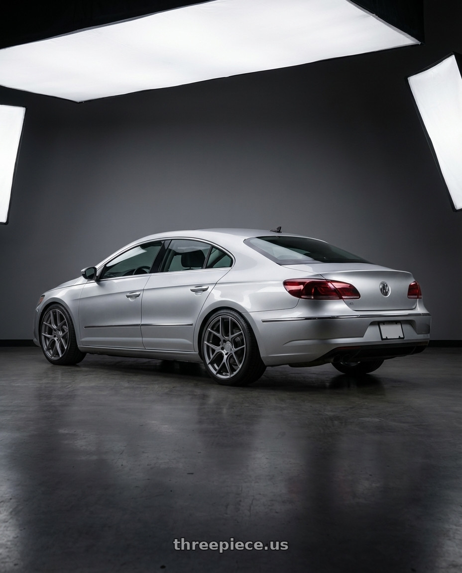 2015 Volkswagen CC with Aodhan AFF2 5x112 19x9.5+35 Matte Gray wheels rear three quarter view square tires