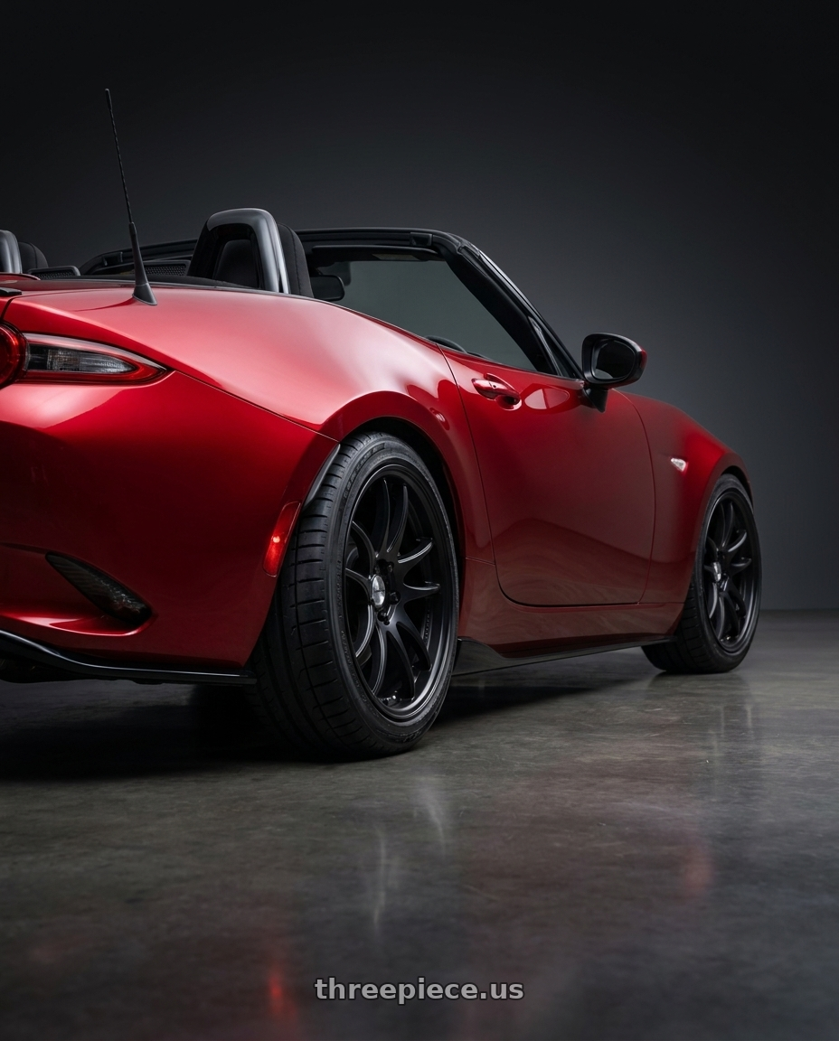 2024 mazda mx5 with Work Cr 2P 4x100 17x8.0 +38 Matte Black wheels rear three quarter view square tires