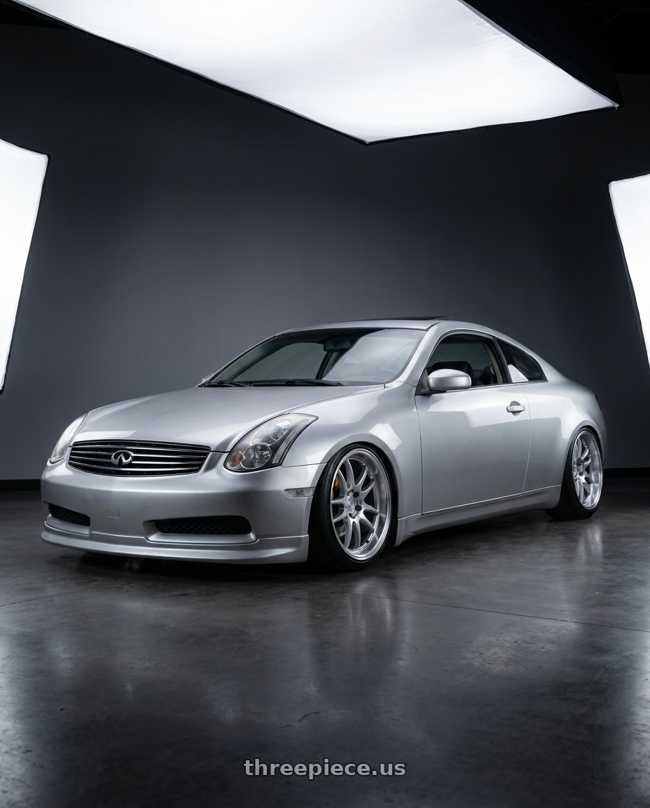 2005 infiniti g35 coupe, silver with Aodhan DS02 5x114.3 18x9.5+15 Silver w/Machined Face wheels