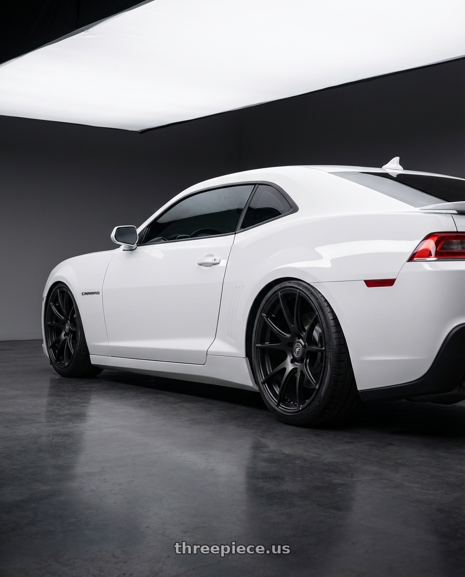 2014 Chevrolet Camaro 5th Gen with Forgestar CF5V 5x120 20x12 +52 Satin Black wheels rear three quarter view slight stretch tires