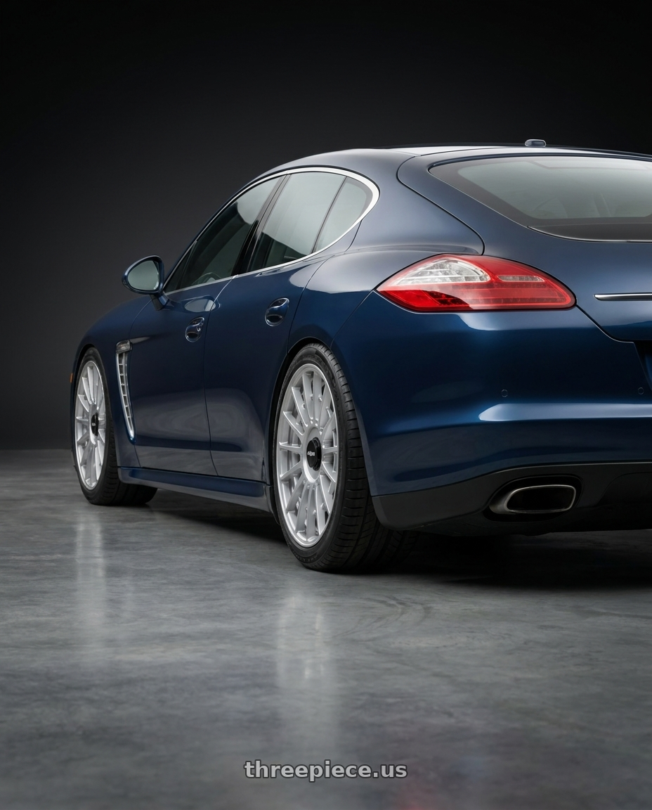 2012 Porsche Panamera with Rotiform 1PC R134 FLG 5X120 18X8.5 +35 GLOSS SILVER wheels rear three quarter view square tires