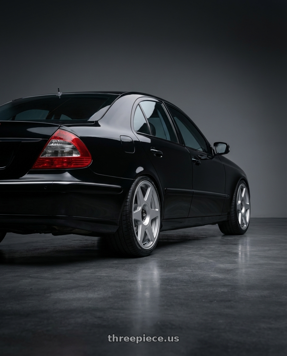 Mercedes E280 W211 2007 with fifteen52 TARMAC EVO 5x108 / 5x112 18x8.5 +45 SPEED SILVER (GLOSS SILVER) wheels rear three quarter view slight stretch tires