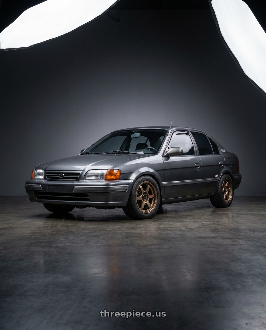 1996 Toyota Tercel EL51 with Konig Hexaform 4x100 15x8+25 Matte Bronze wheels
