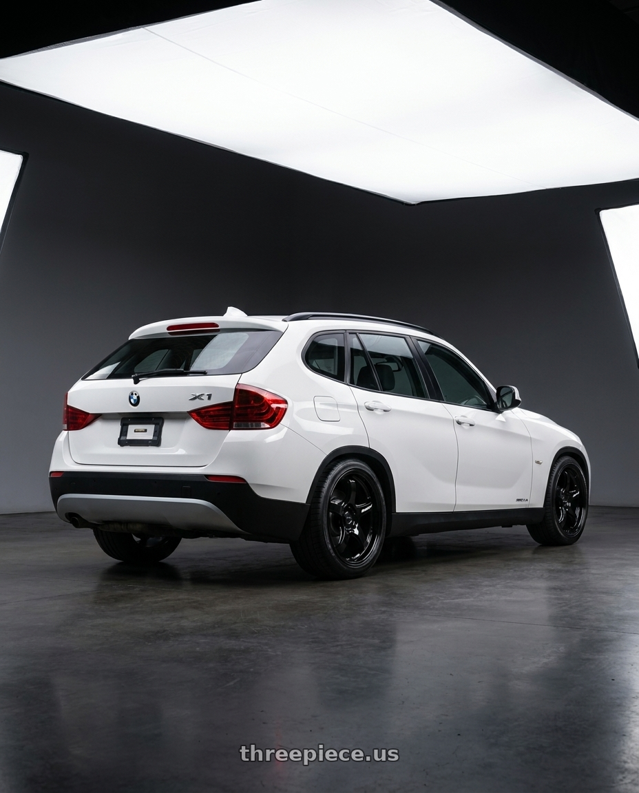 2011 Bmw X1 White with WedsSport RN-05M 5x112 18x9.0+32 Gloss Black wheels rear three quarter view square tires