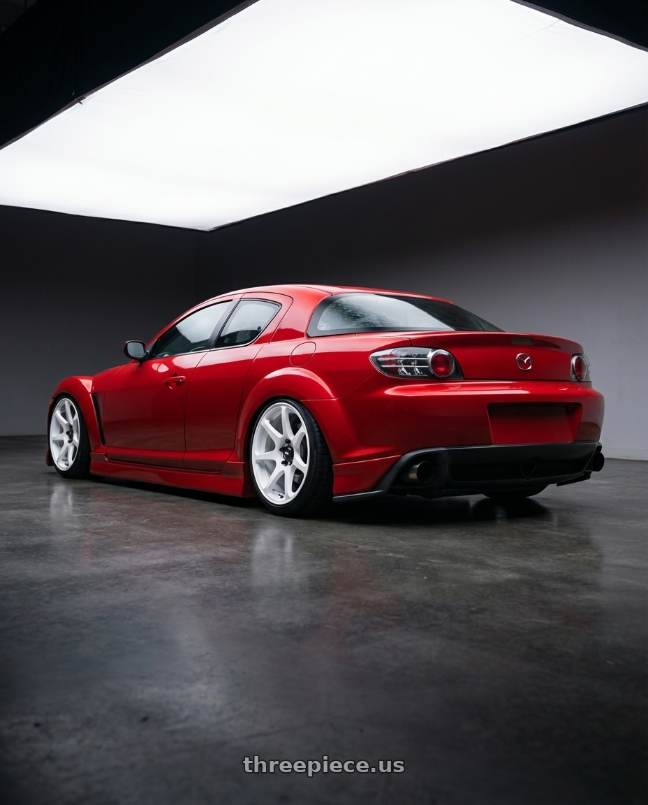 2004 Mazda RX-8 with Motegi MR154 BATTLE 5X114.3 17X9.5 +30 WHITE wheels rear three quarter view slight stretch tires