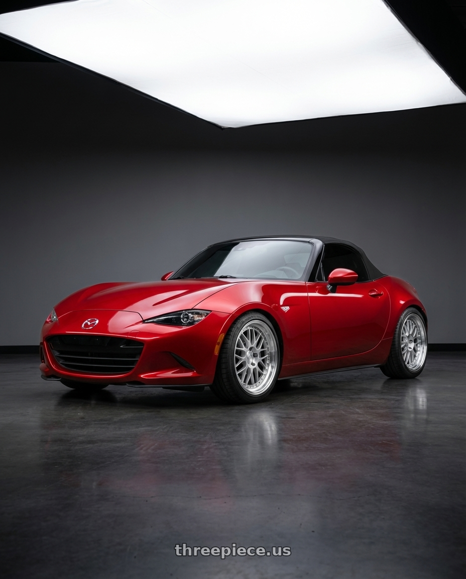2015 Mazda Miata, Red with Aodhan AH02 4x100 / 4x114.3 17x8+35 Silver w/ Machined Lip wheels front three quarter view lowered stance