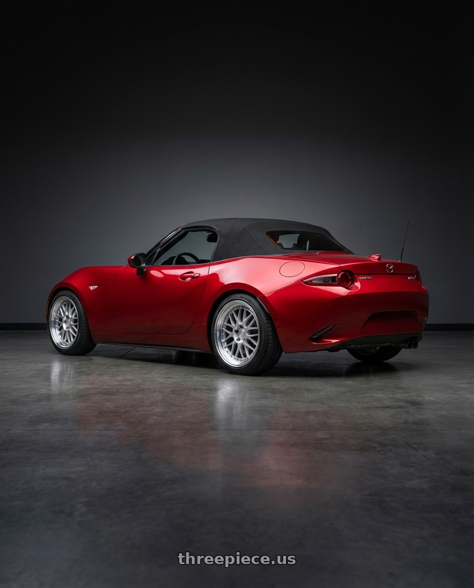 2015 Mazda Miata, Red with Aodhan AH02 4x100 / 4x114.3 17x8+35 Silver w/ Machined Lip wheels rear three quarter view square tires