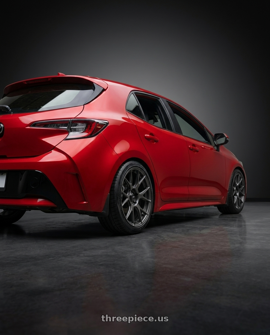 2022 Corolla Sport with Konig Ampliform 5x100 18x8.5+44 Dark Metallic Graphite wheels rear three quarter view square tires