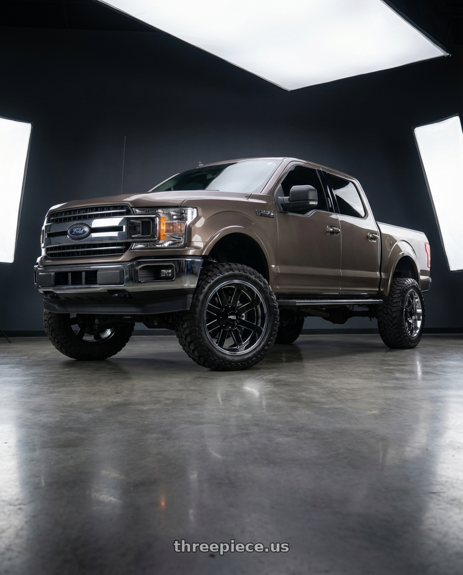 2019 Ford F-150 with Moto Metal MO200 6X135 22X10 -18 GLOSS BLACK MILLED CENTER CHROME LIP wheels front three quarter view lifted stance