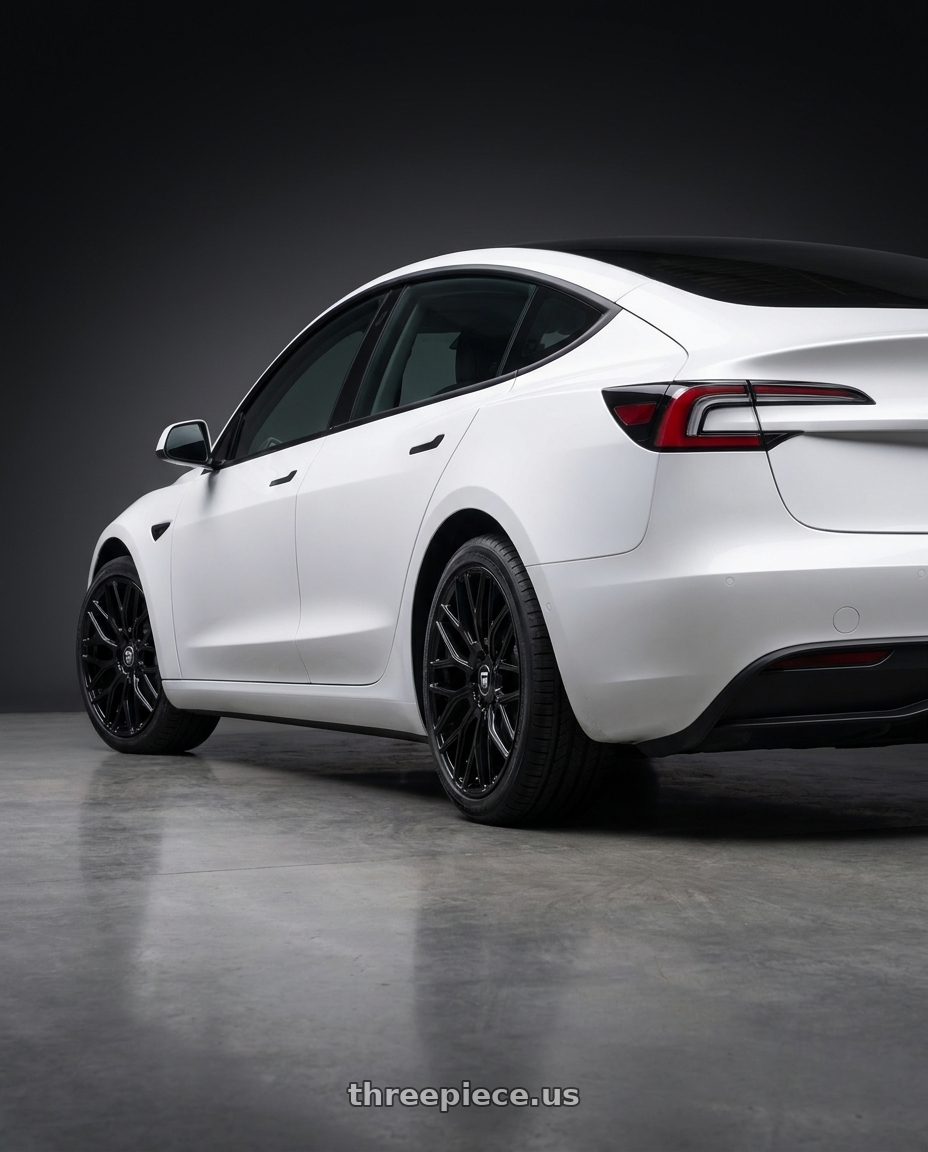 2025 Tesla Model 3 with TOUREN TR76 3276 5x112 19x8.5 +35 GLOSS BLACK wheels rear three quarter view square tires