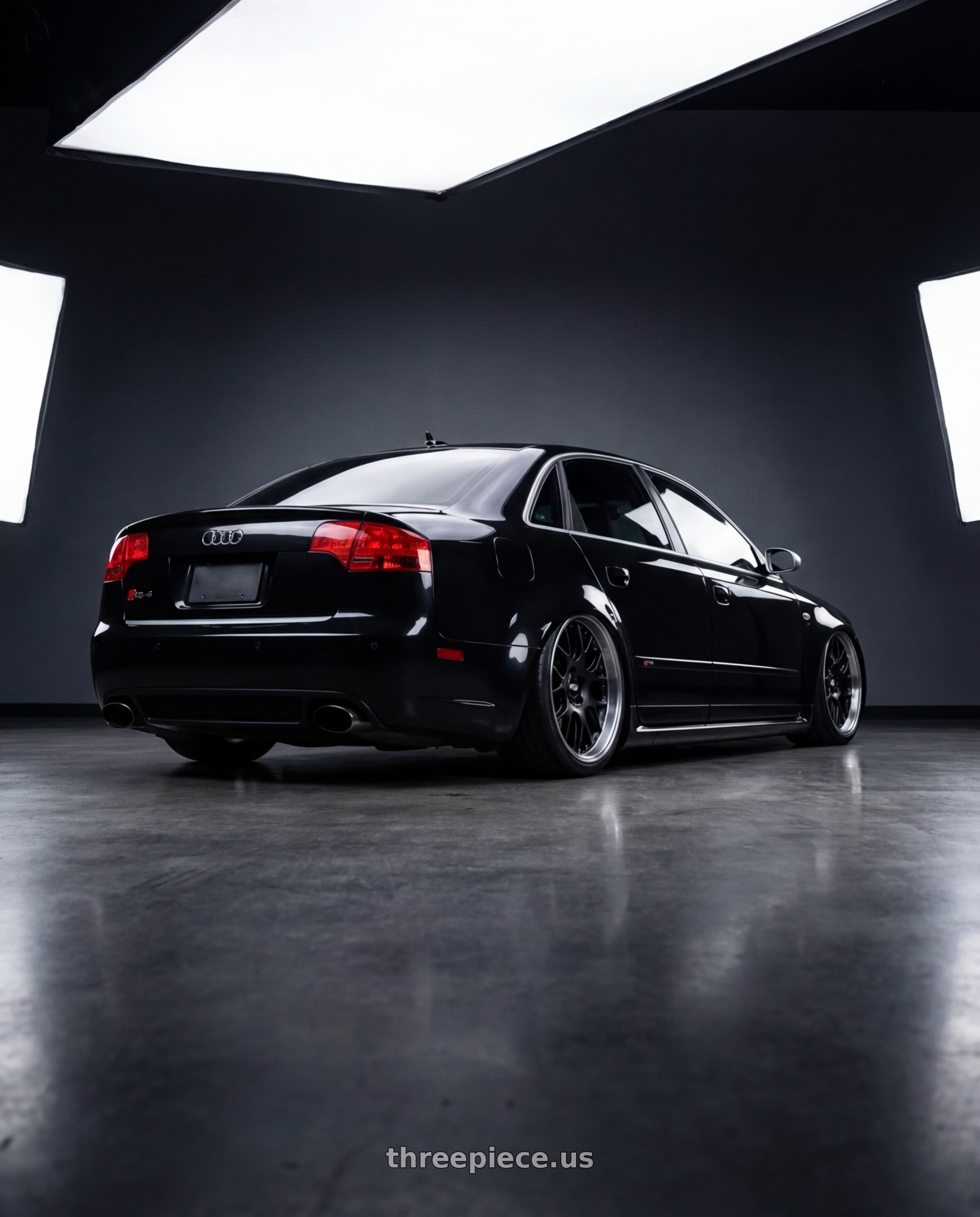 2007 b7 audi rs4 black with BBS CH-RII 5x130 22x11.5 +50 Satin Black Center Platinum Lip SS Rim Protector wheels rear three quarter view slight stretch tires