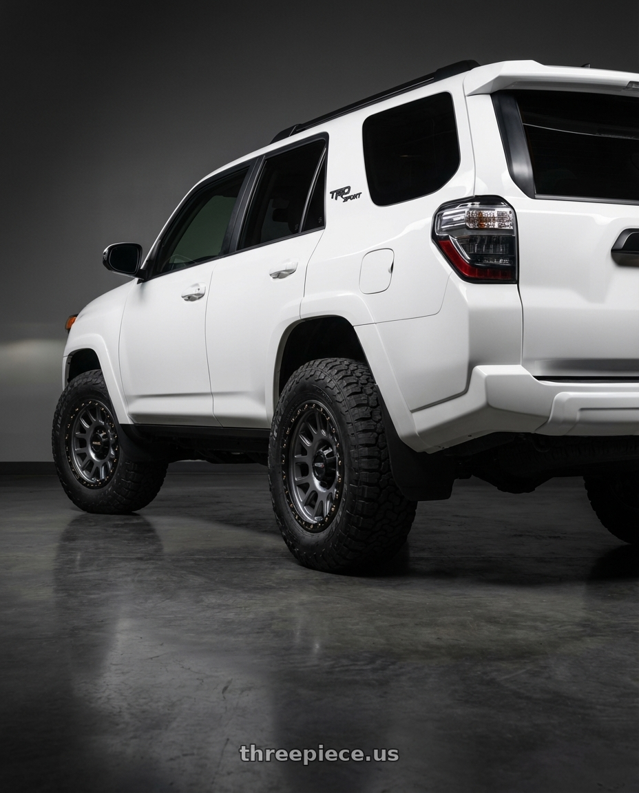 2022 Toyota 4Runner with Vision Off-Road 111 Nemesis 6x139.7 17x9-12 Gunmetal wheels rear three quarter view meaty tires