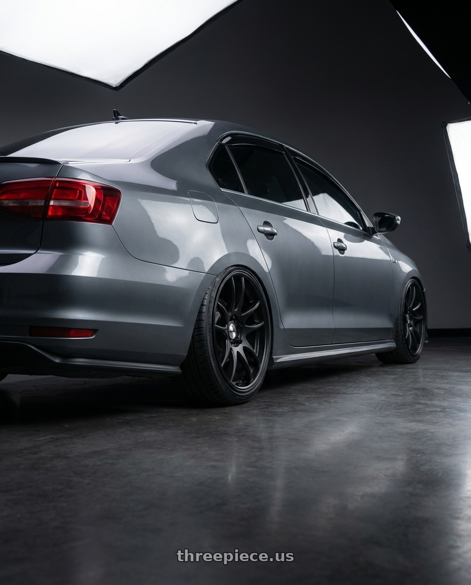 2016 VW gli with Work Cr 2P 5x114.3 18x8.5 +38 Matte Black wheels rear three quarter view slight stretch tires