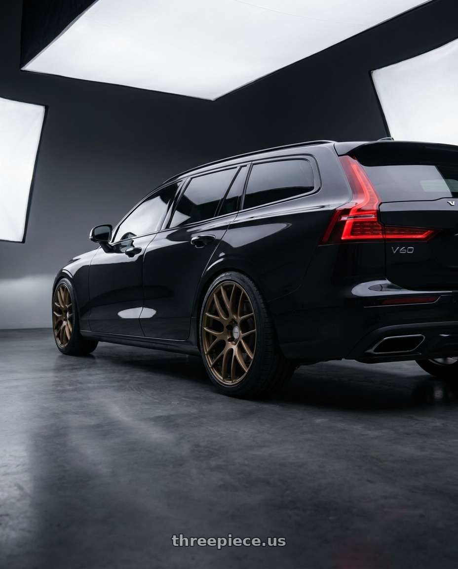 2020 Volvo v60 t5 r with Work Emotion m8r 5x108 19x8.5 +38 Matte Bronze wheels rear three quarter view square tires