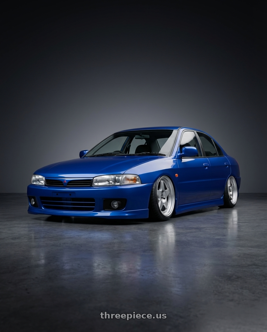 1998 Mitsubishi Lancer with Kansei K15H Astro 5x114.3 18x9 22 Hyper Silver wheels front three quarter view slammed stance