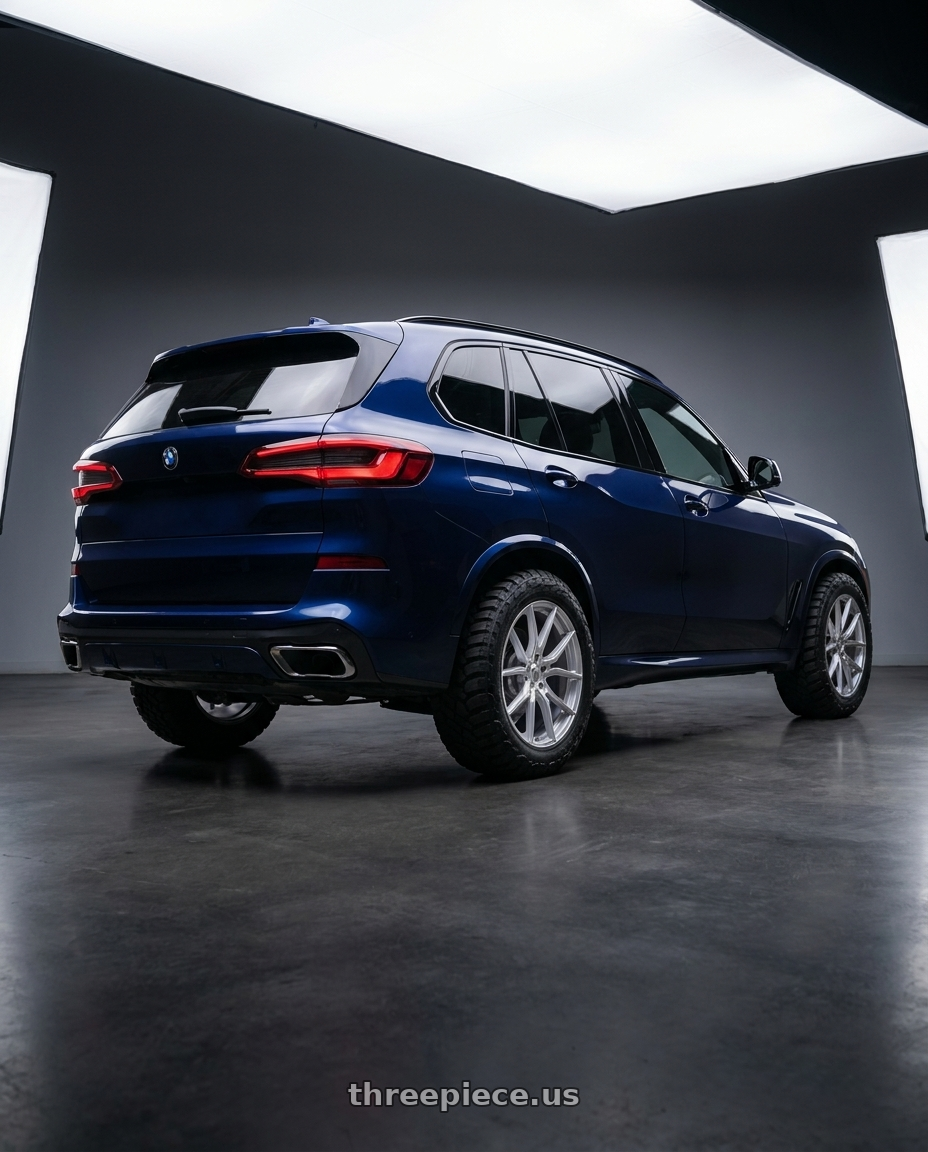 2026 BMW X5 with TOUREN TF01 3501 5x112 22x10.5 +45 GLOSS SILVER BRUSHED wheels rear three quarter view meaty tires