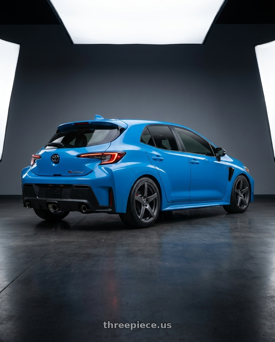 2024 Toyota GR Corolla with Forgestar CF5 5x114.3 18x10 +42 Gloss Anthracite wheels rear three quarter view square tires