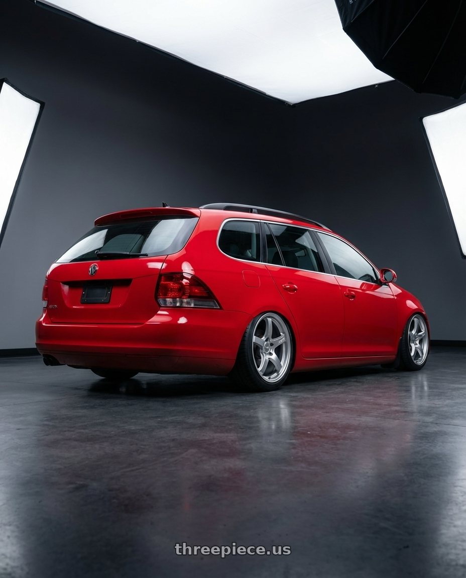 2014 VW jsw with Gram Lights 57CR 5x114.3 18x9.5+38 Grace Silver wheels rear three quarter view meaty tires