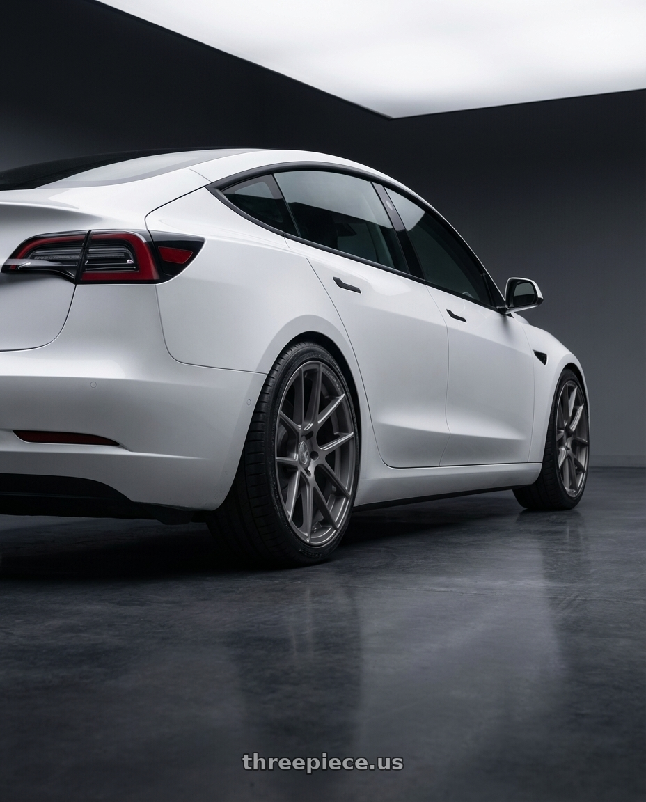 2023 Tesla Model 3 with Avant Garde Wheels M510 5X114.3 19x9.5 +40 Dolphin Grey wheels rear three quarter view square tires