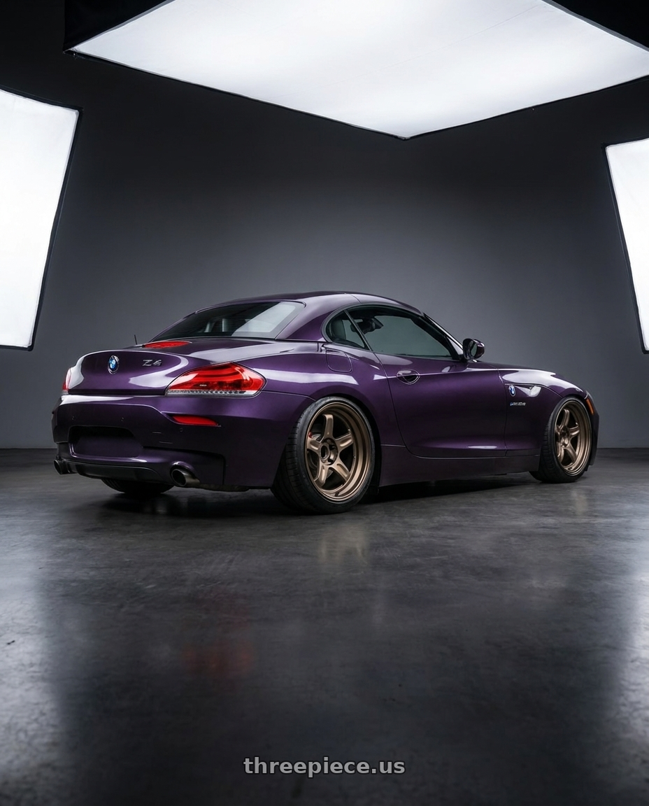 2011 bmw z4 with Volk Racing 21C 5x120 18x9.5 +20 BRONZE wheels rear three quarter view slight stretch tires