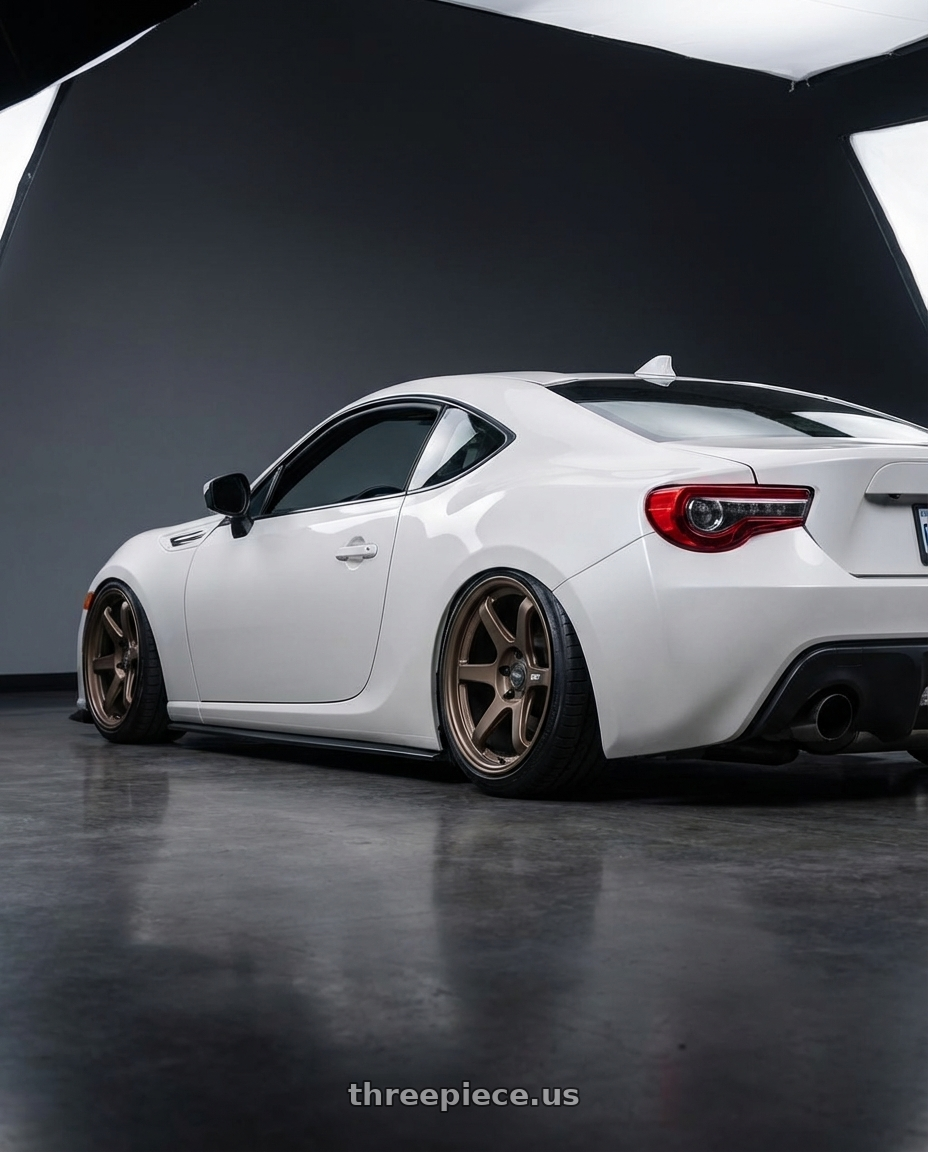 2016 Scion FR-S with ESR Wheels APEX SERIES AP6 5x100 18x9.5 +35 Matte Bronze wheels rear three quarter view slight stretch tires