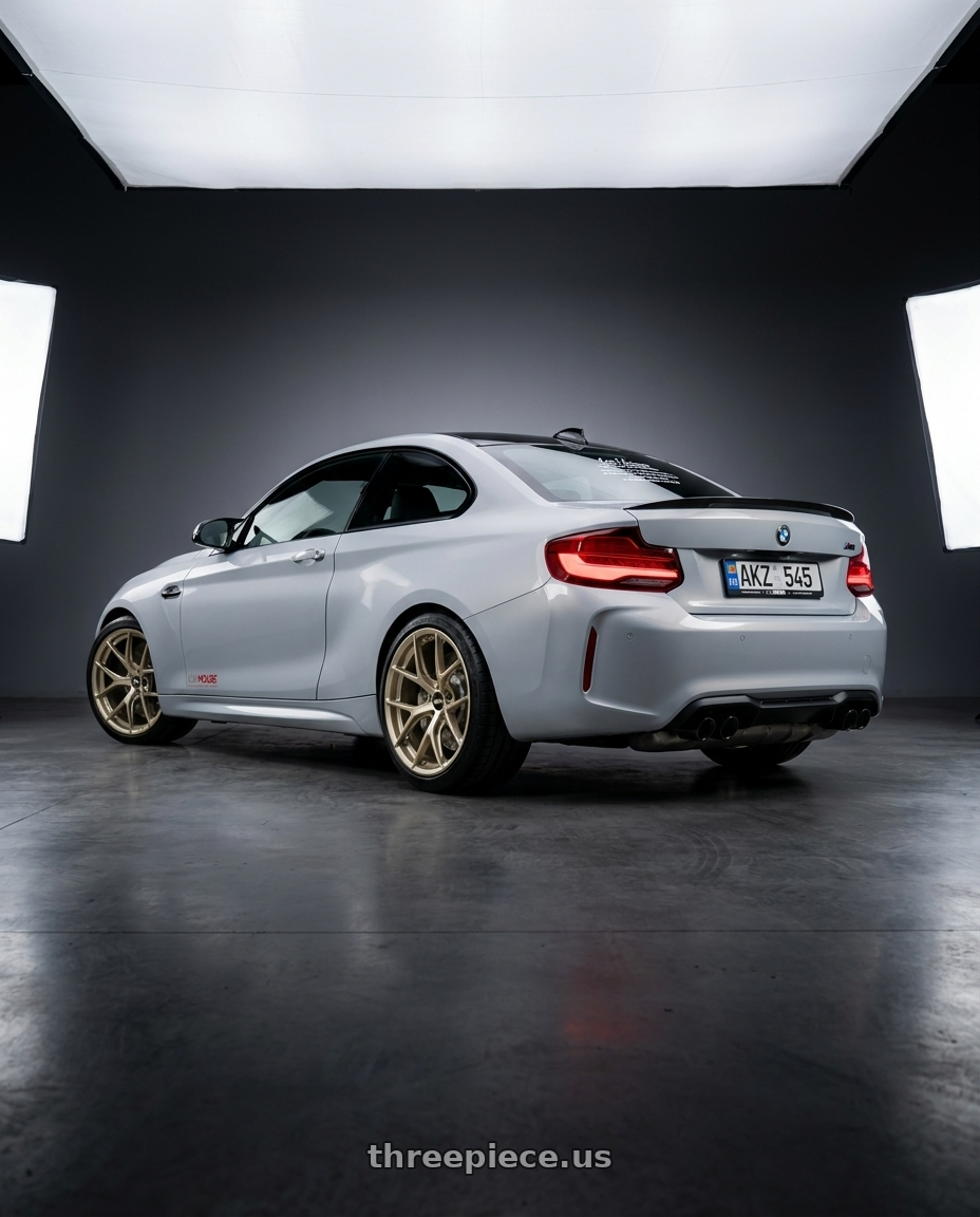 2020 Bmw m2 with BBS FI-R Evo 5x112 19x9.5+15 White Gold wheels rear three quarter view square tires