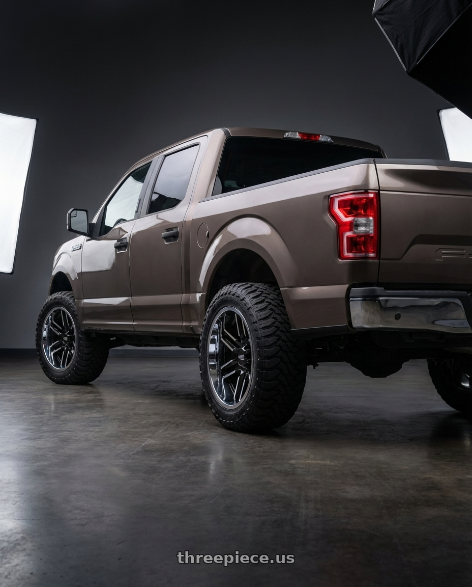 2019 Ford F-150 with Moto Metal MO202 6X135 20X12 -44 GLOSS BLACK MACHINED CENTER CHROME LIP wheels rear three quarter view meaty tires