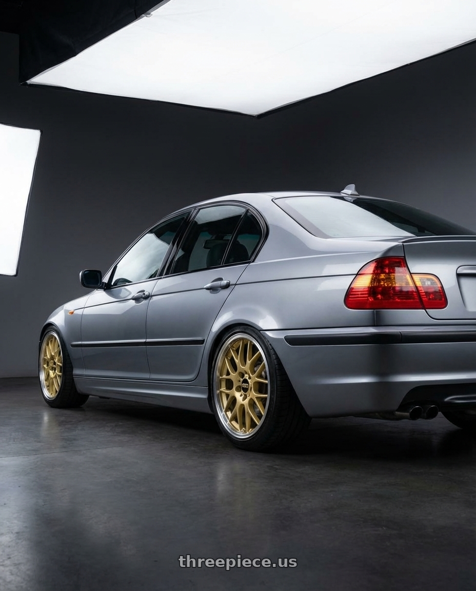 2004 BMW 330i ZHP Silbergrau Metallic with BBS RG-R 5x114.3 18x8.5 +36 Gold wheels rear three quarter view slight stretch tires