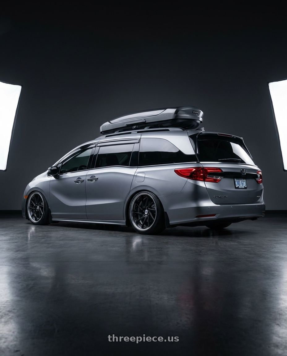 2024 Honda Odyssey with Work Gnosis Cvs 5x120 20x8+38 W Disk Matte Black wheels rear three quarter view extreme stretch tires