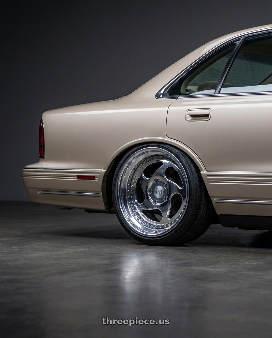 1992 Oldsmobile 98 Regency Elite with Heritage Wheel AVUS wheels rear three quarter view slight stretch tires