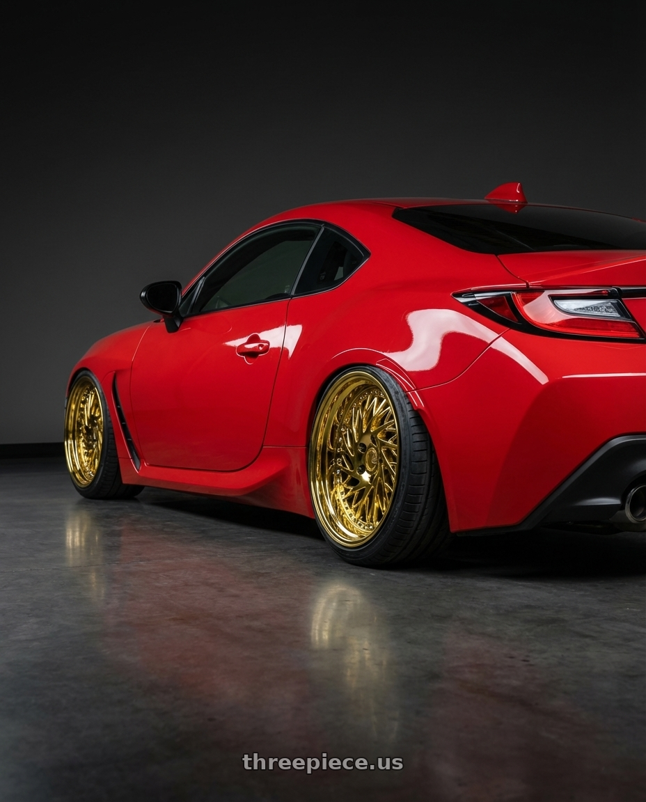 2024 Toyota GR86 with Aodhan DS03 5x114.3 18x9.5 +30 Gold Vacuum w/ Chrome Rivets wheels rear three quarter view slight stretch tires