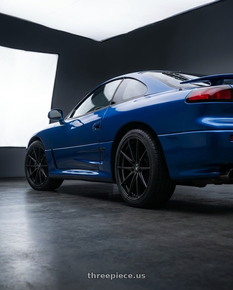 1994 dodge stealth r t with Konig Oversteer 5x114.3 17x8+35 Gloss Black wheels rear three quarter view square tires