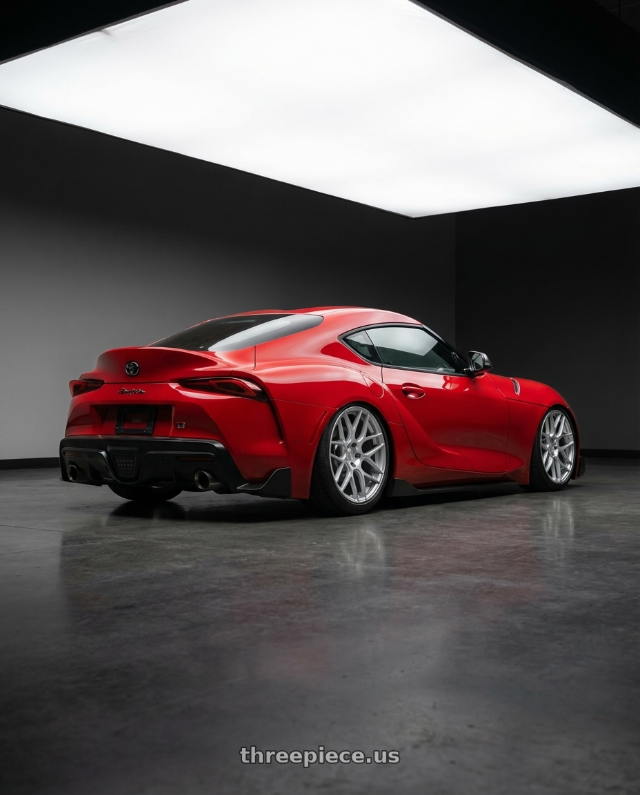 2023 Toyota GR Supra with Aodhan AFF2 5x112 19x9.5+35 Gloss Silver Machined Face wheels rear three quarter view slight stretch tires