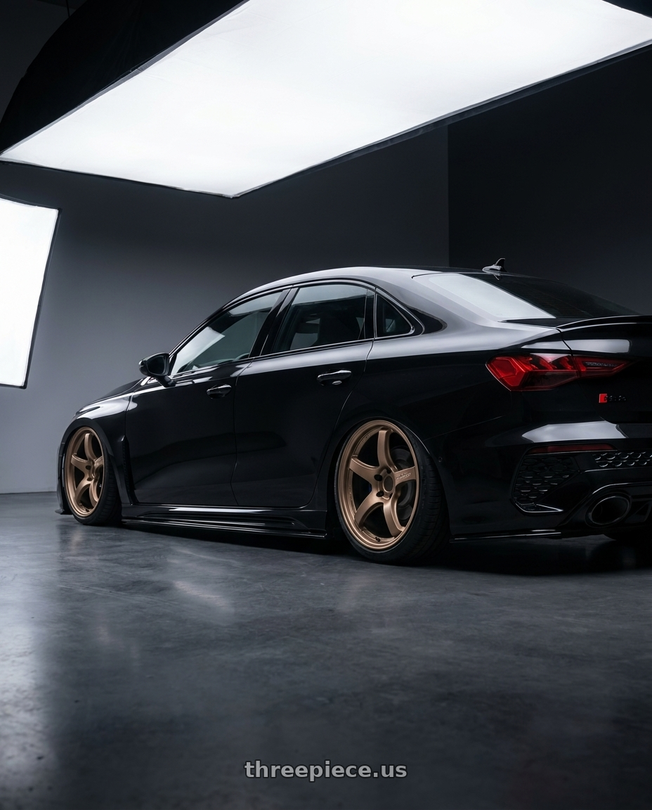 2022 Audi RS3 8Y with Gram Lights 57CR 5x112 19x9.5+25 Bronze II wheels rear three quarter view slight stretch tires