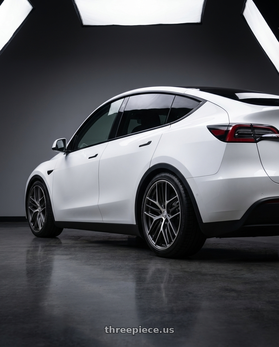 2024 Tesla Model Y with BBS CC-R 5x114.3 20x9.5+35 Graphite w/ Diamond Cut Face wheels rear three quarter view square tires