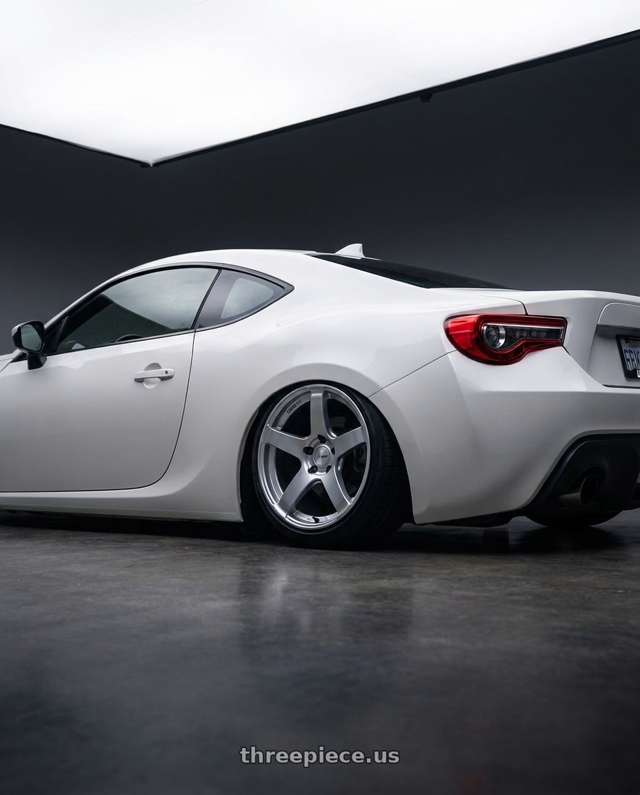 2016 Scion FR-S with Ssr Gtv01 5x100 18x8.5+44  GLARE SILVER wheels rear three quarter view slight stretch tires