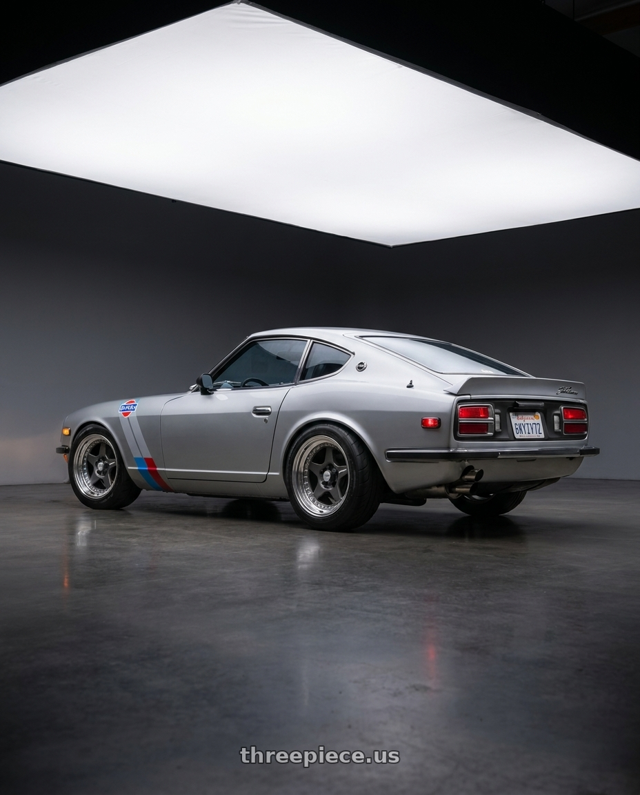 1974 260z nissan with Work Meister Cr01 4x114.3 16x8+20 O Disk Matte Gunmetal wheels rear three quarter view square tires