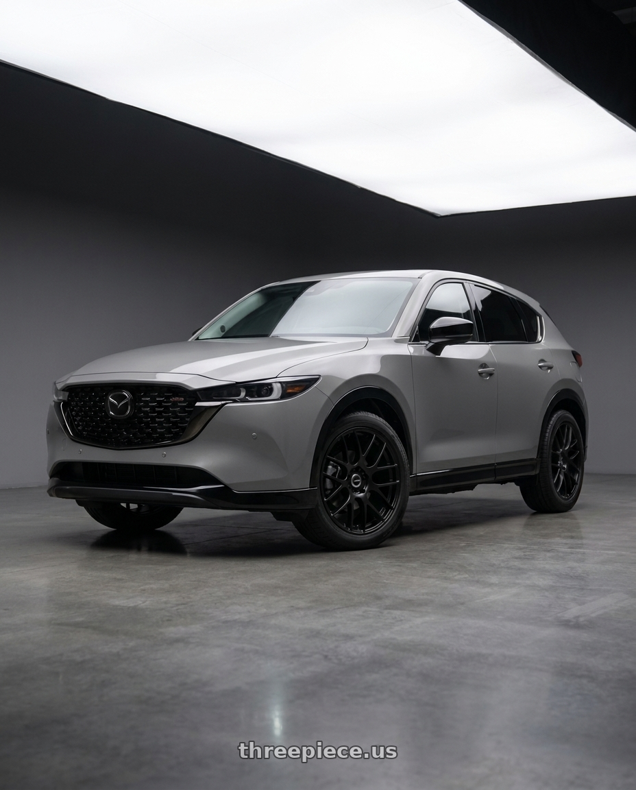 2026 Mazda CX-5 with Work Emotion m8r 5x114.3 20x8.5 +45 Grants Black wheels front three quarter view stock stance