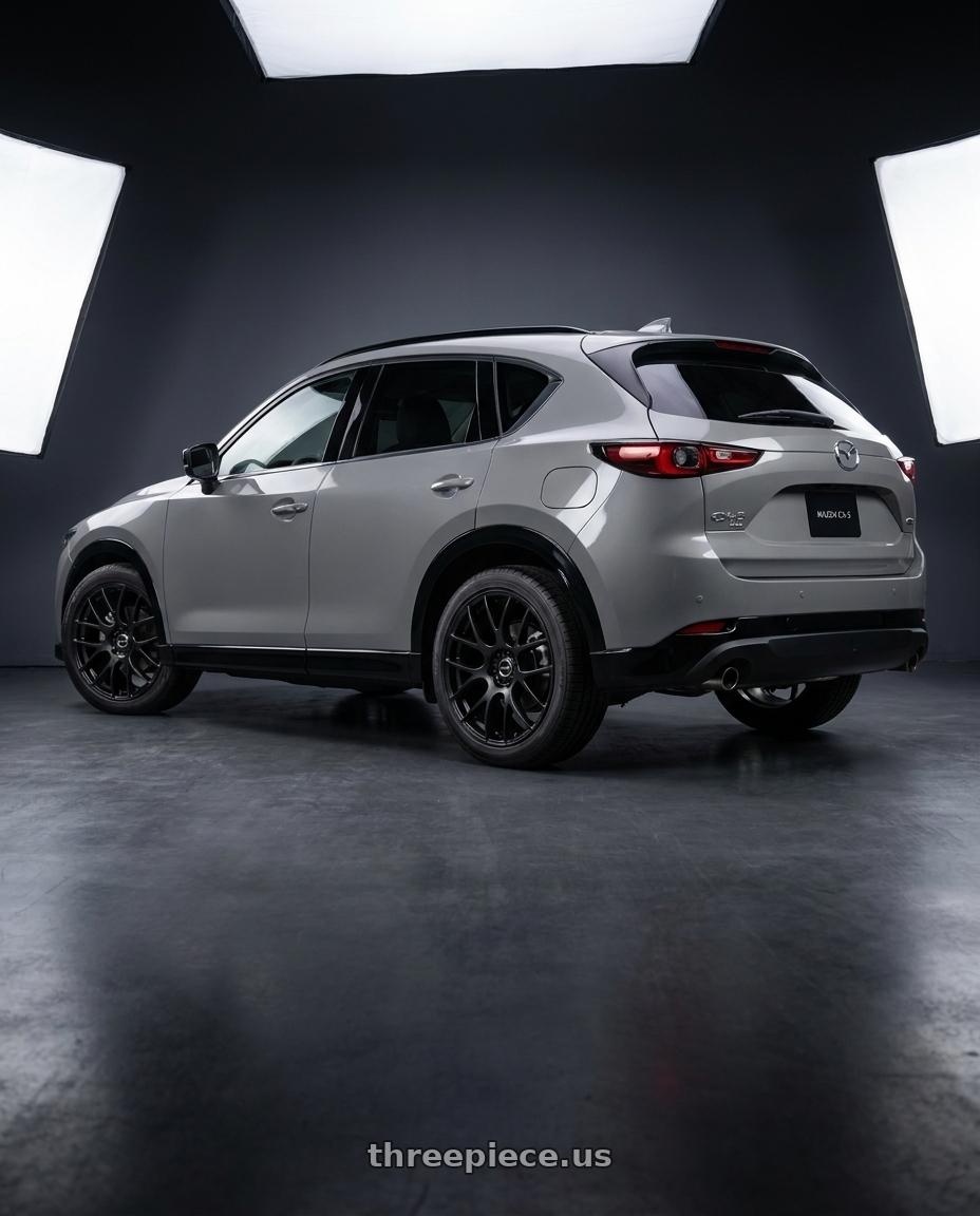 2026 Mazda CX-5 with Work Emotion m8r 5x114.3 20x8.5 +45 Grants Black wheels rear three quarter view square tires