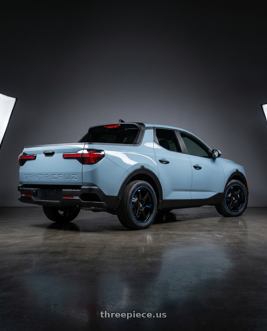 2026 Hyundai Santa Cruz SEL Activity  with Spec-1 SPT-33 5x114.3/5x120 18x8.5 +38 Gloss Black & Blue Line wheels rear three quarter view square tires