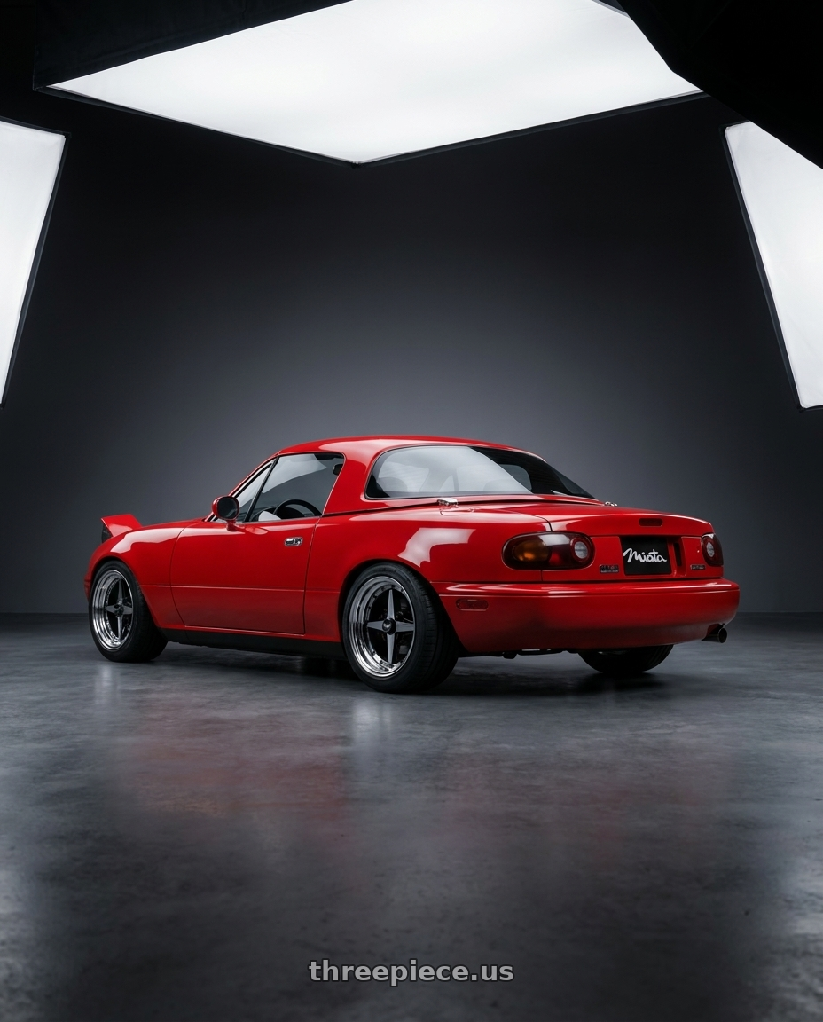 1990 Mazda Miata with Equip 01 Black Polish 4x100 15x8 +35 wheels rear three quarter view square tires