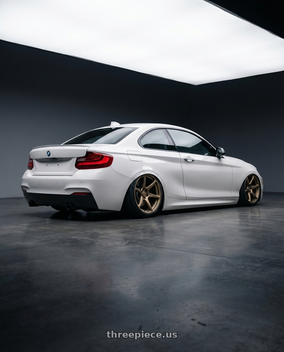 2018 BMW 2 Series F22 with Kansei K11B Tandem 5X120 19x10.5 22 Bronze wheels rear three quarter view slight stretch tires