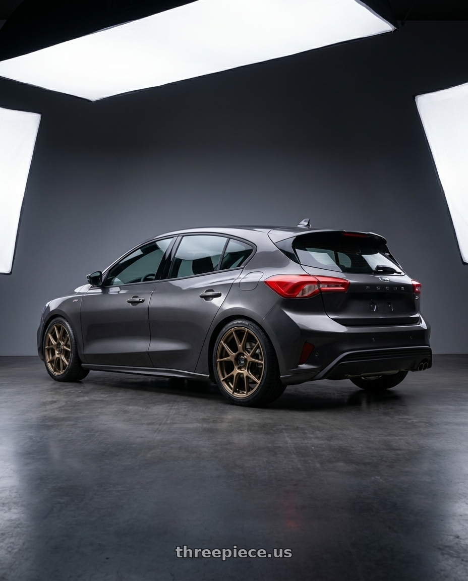2021 Focus St Line Lommel with Konig Ampliform 5x112 18x8.5+43 Gloss Bronze wheels rear three quarter view square tires